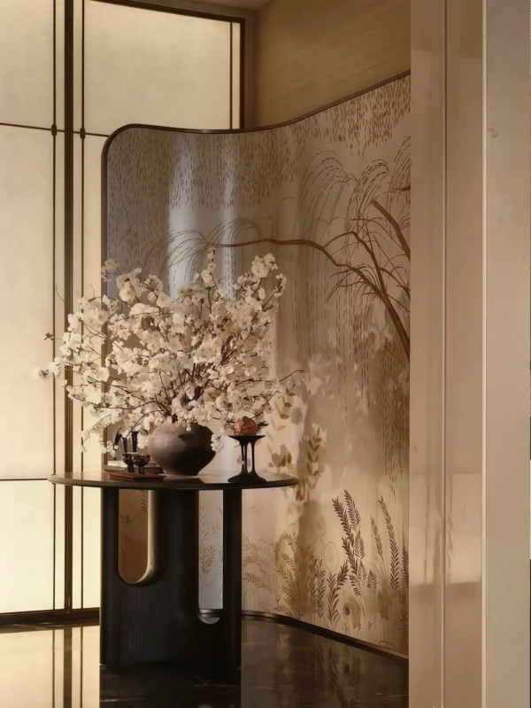 Gold Leaf Screen with Painted Plum Tree in brushed brass — in a room setting