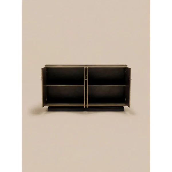 Black Walnut Sideboard with Gilded Swirl Relief Doors in brushed brass — in a room setting