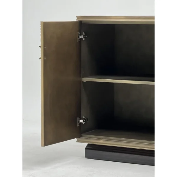Black Walnut Sideboard with Gilded Swirl Relief Doors in brushed brass — in a room setting