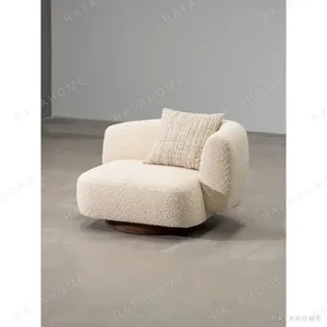 Asymmetric Wool Lounge Chair on Ash Base in oatmeal — in a room setting