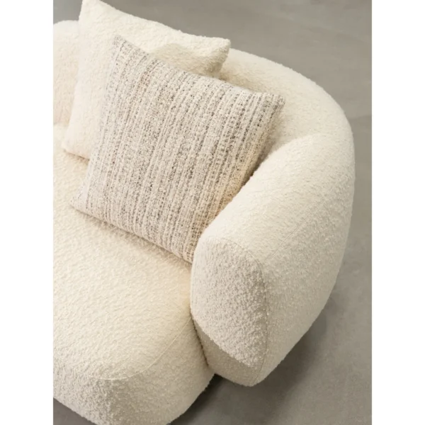 Asymmetric Shearling Lounge Chair on Wood Base in oatmeal — in a room setting