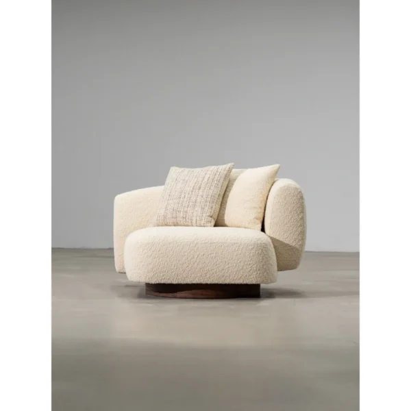 Asymmetric Shearling Lounge Chair on Wood Base in oatmeal — in a room setting