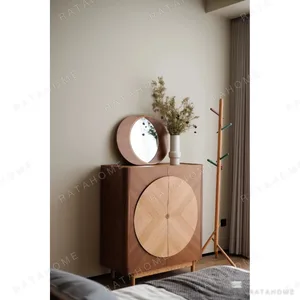 Reunion Cabinet in Walnut and Oak Marquetry with Round Motif — in a room setting