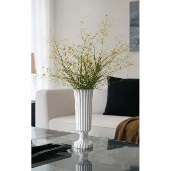Hand-Made Ribbed Matte White Flared Ceramic Vase in ivory — in a room setting