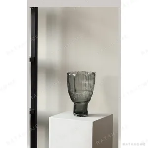 Ribbed Smoked Grey Glass Vase with Torn Rim in slate — in a room setting