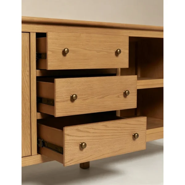 Ridge-Carved Oak Sideboard with Open Shelf in natural oak — in a room setting