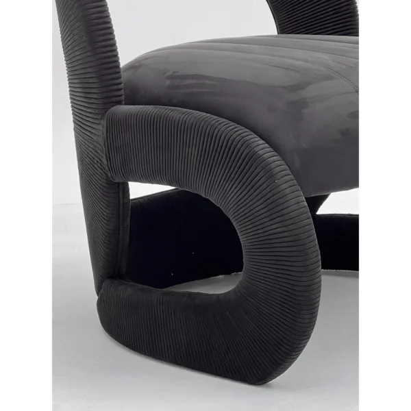 Ring-Frame Pleated Corduroy and Suede Lounge Chair in Black — in a room setting