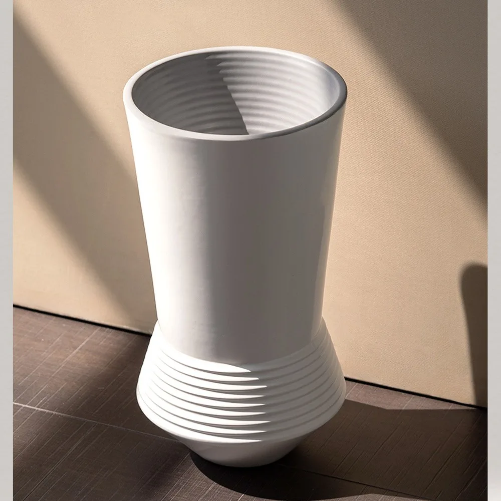 Ring-Stacked Waisted White Ceramic Vase in ivory — front view