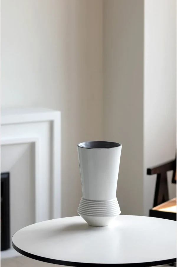 Ring-Stacked Waisted White Ceramic Vase in ivory — in a room setting