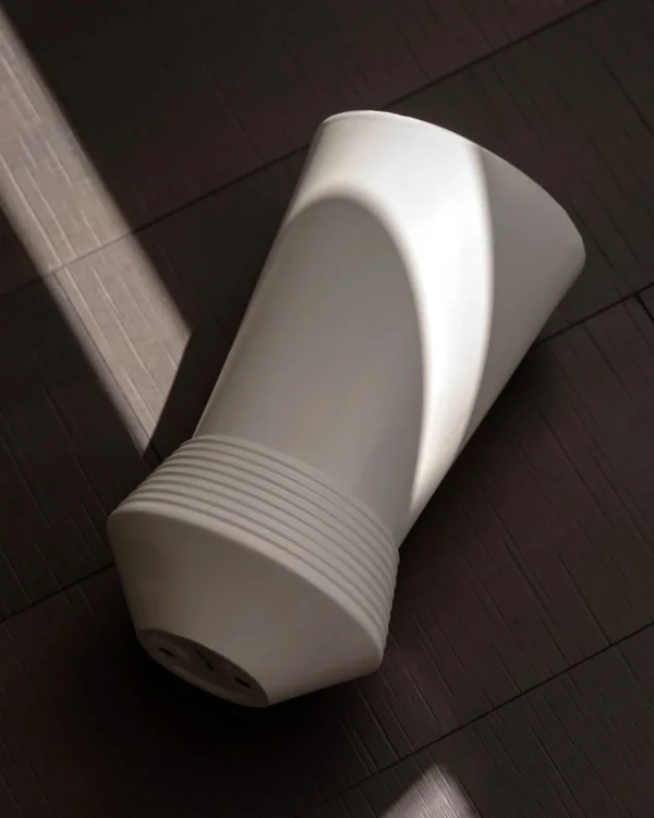 Ring-Stacked Waisted White Ceramic Vase in ivory — in a room setting