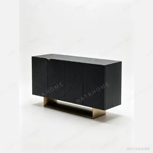 Ripple Black Ash Sideboard on Brass Base in black — in a room setting
