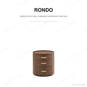 Rond Round Walnut Three-Drawer Nightstand in walnut — in a room setting