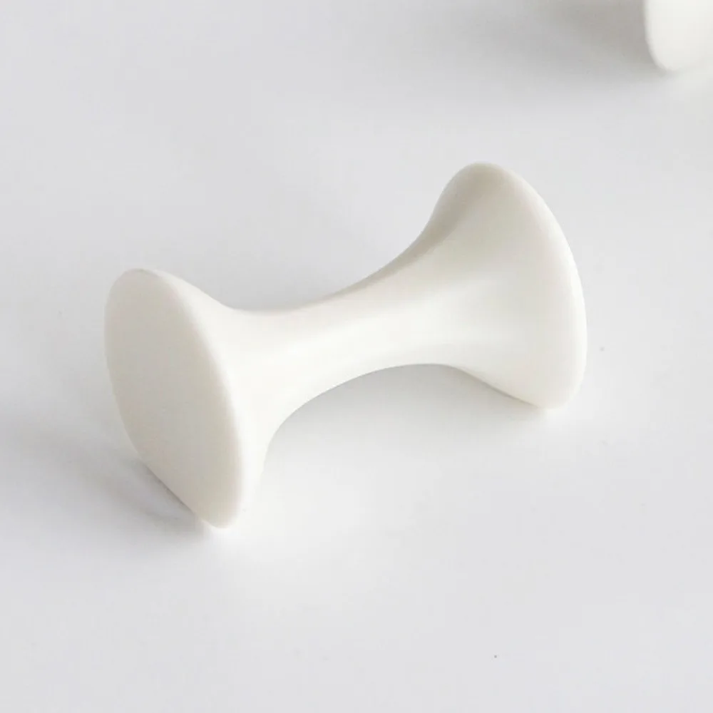 Artist Collaboration Ridged Ceramic Chopstick and Spoon Rest in ivory — front view