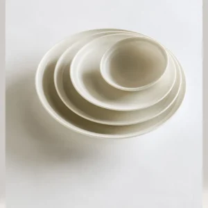 Artist Collaboration Lipped Flat Plates in oatmeal — front view
