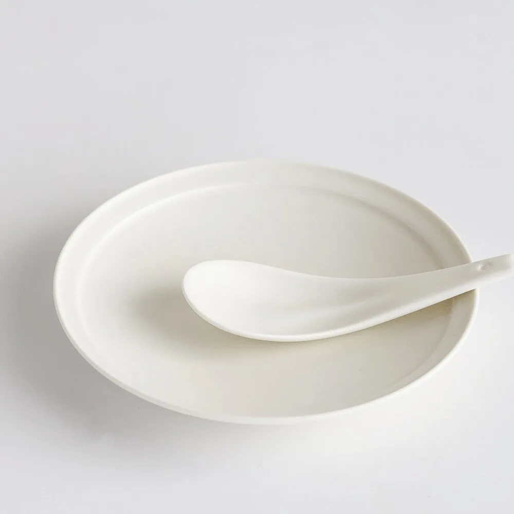 Artist Collaboration Leaf-Shaped Ceramic Spoons in Off-White — front view