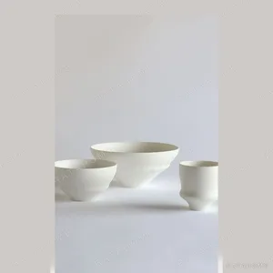 Artist Collaboration Small-Belly Bowls and Cups in Off-White — in a room setting