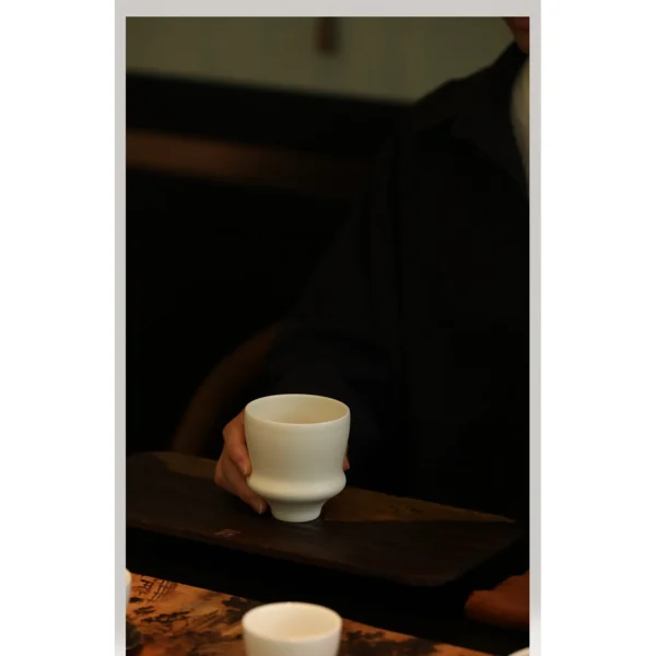 Artist Collaboration White Porcelain Cup and Saucer Gift Set in ivory — in a room setting
