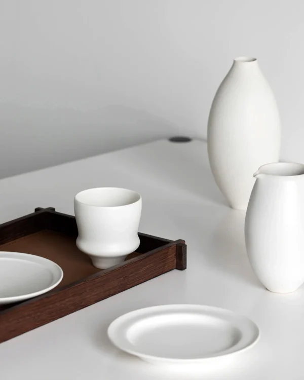 Artist Collaboration White Porcelain Cup and Saucer Gift Set in ivory — in a room setting