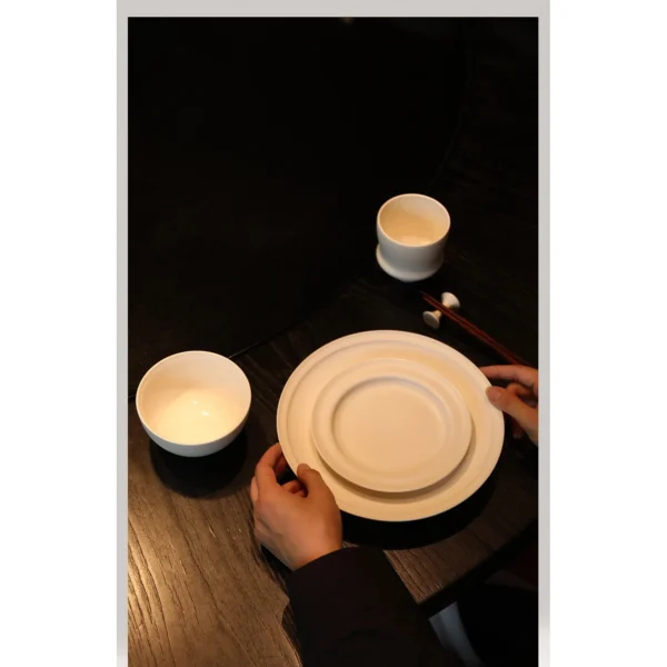 Artist Collaboration White Porcelain Tableware Set for Four in ivory — in a room setting