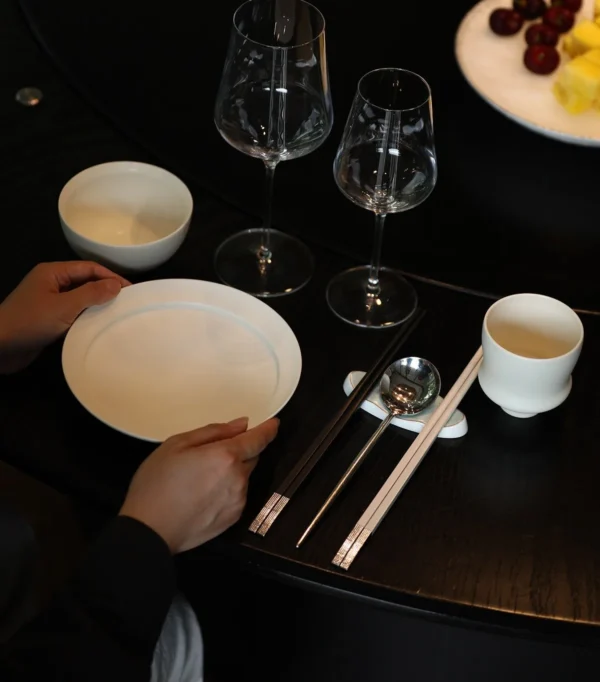 Artist Collaboration White Porcelain Tableware Set for Four in ivory — in a room setting
