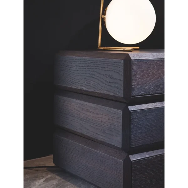 Rotating Three-Drawer Nightstand in Smoked Oak — in a room setting