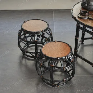 Round Dark Bamboo Drum Stool with Open Lattice in black — in a room setting