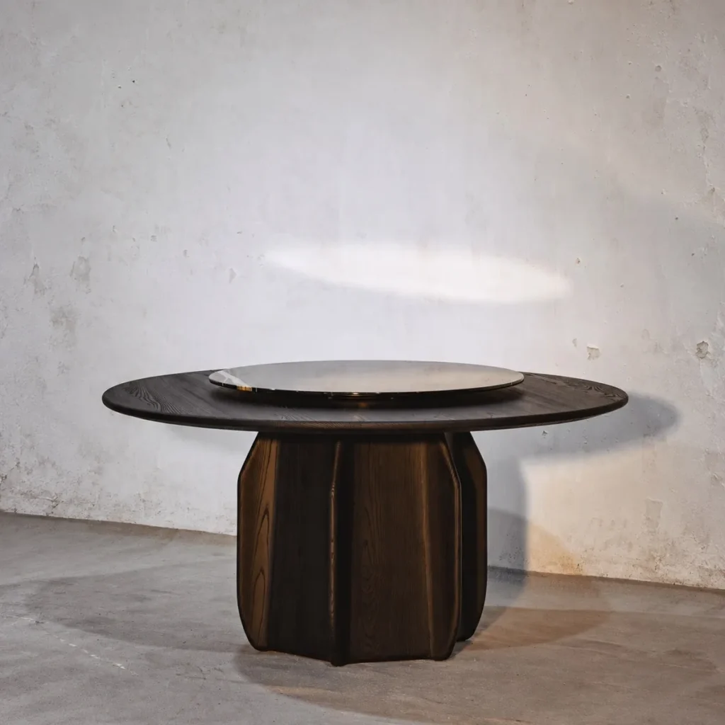 Dark Solid Wood Round Dining Table in black — front view