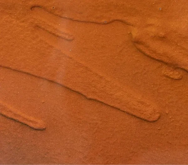 Round Amber Glass Disc Wall Art, 80 cm in rust — detail