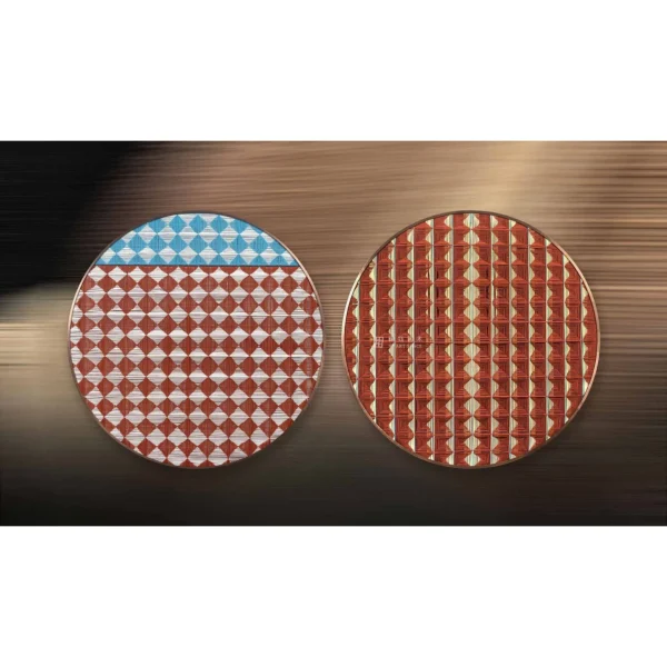 Round Geometric Tile Disc Set of 2 in Rust and Blue — in a room setting