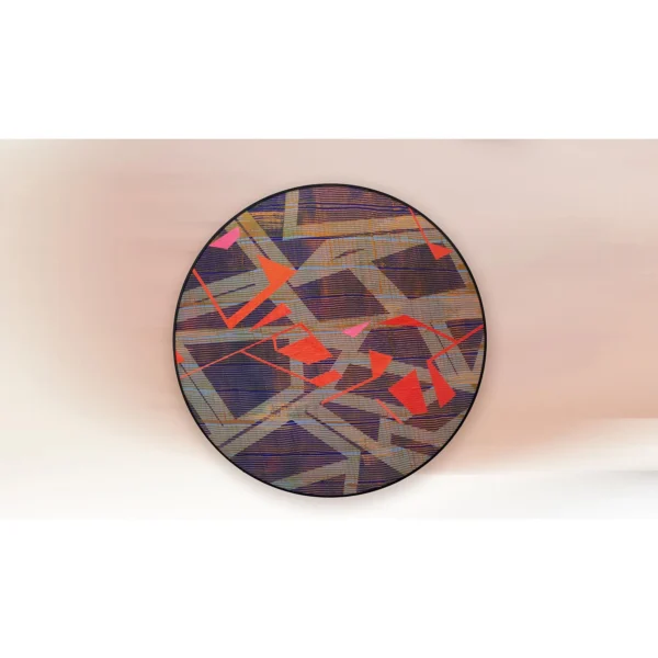 Round Geometric Collage Disc in Tan, Navy and Coral, 120 cm — in a room setting