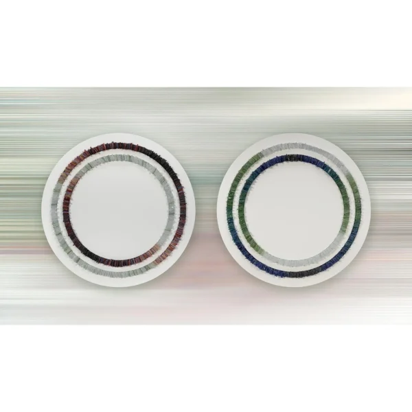 Round Woven Ring Wall Art Set of 2 in Green and Blue — in a room setting