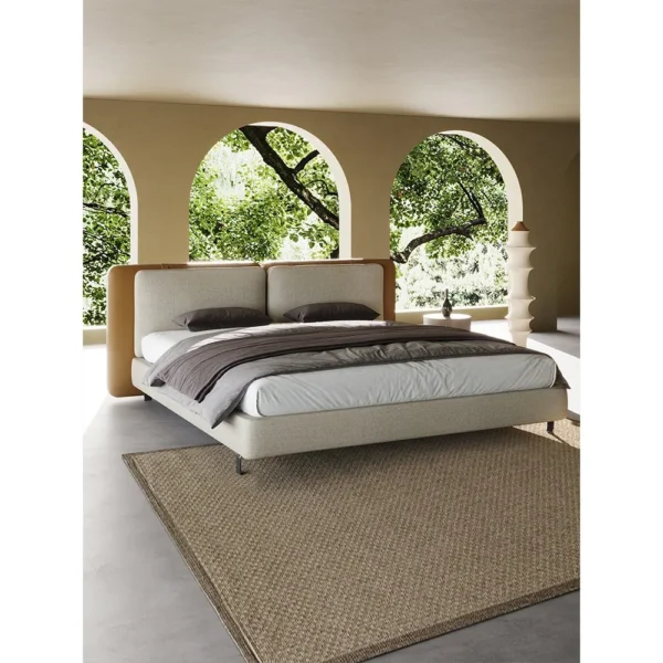 Saddle Leather and Linen Wide Headboard Bed in clay — in a room setting