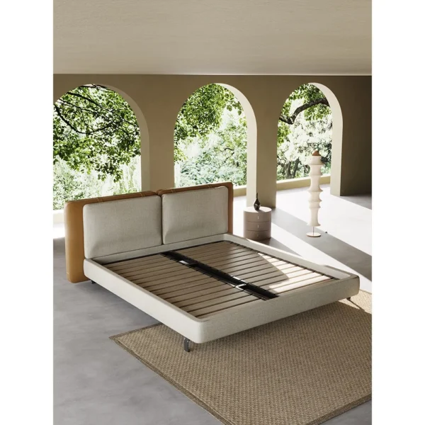Saddle Leather and Linen Wide Headboard Bed in clay — in a room setting