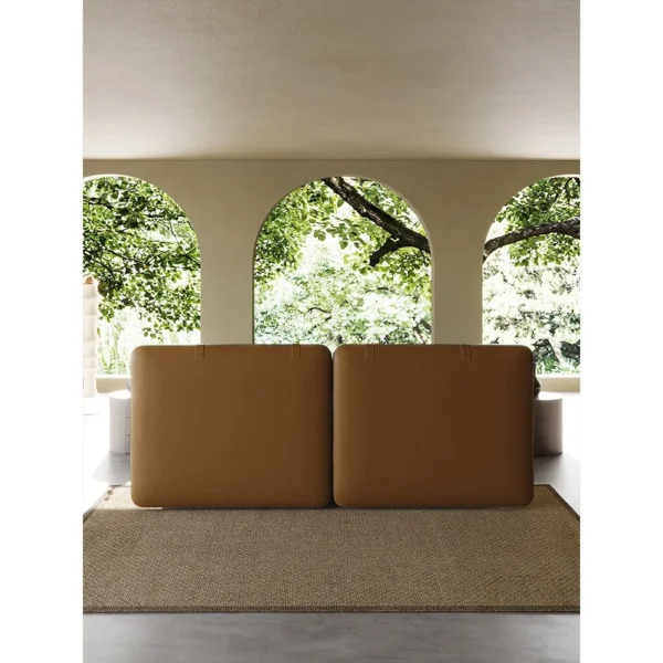 Saddle Leather and Linen Wide Headboard Bed in clay — in a room setting