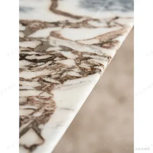 Sailboat Ocean Storm Stone Dining Table on Rose Gold Sails in clay — in a room setting