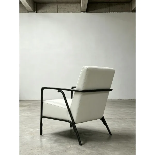 Forged Bronze Armchair in Cream Leather, 65 cm — in a room setting