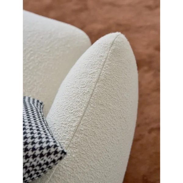 Ring-Arm Curved Sofa in Cream Fabric with Ring Detail — in a room setting