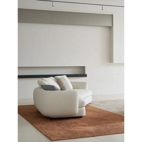 Curved Sofa in Cream Wool Bouclé with Goose Down — in a room setting