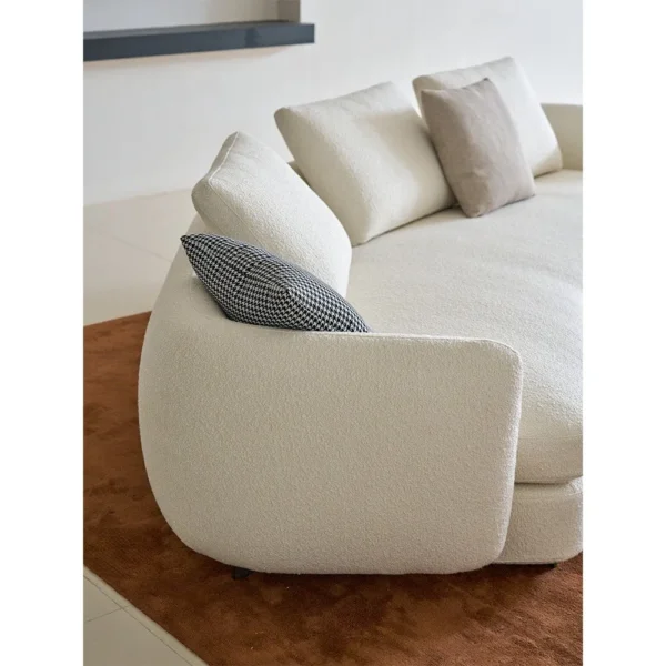 Curved Sofa in Cream Wool Bouclé with Goose Down — in a room setting