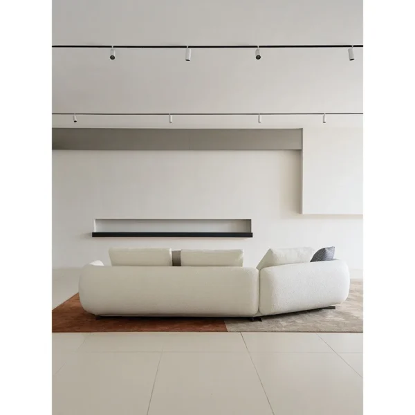 Curved Sofa in Cream Wool Bouclé with Goose Down — in a room setting