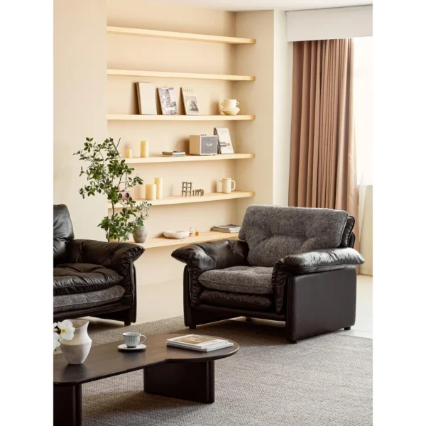 Sandwich Single-Seat Sofa in Black Leather and Grey Bouclé — in a room setting
