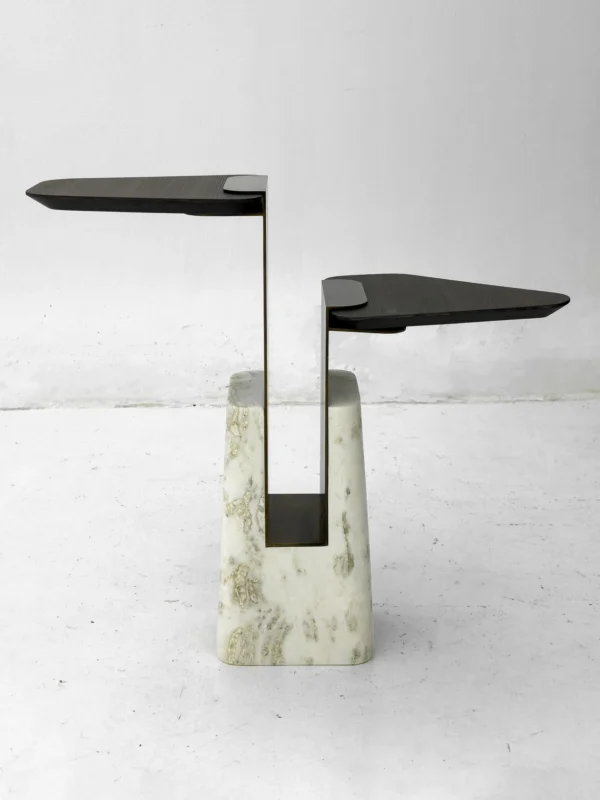 Sculptural Two-Tier Wood Side Table on Marble Block Base in black — in a room setting