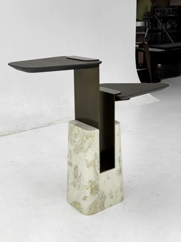 Sculptural Two-Tier Wood Side Table on Marble Block Base in black — in a room setting