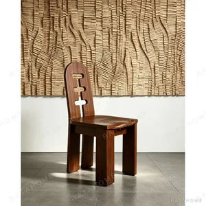 Round Oak Dining Table on Perforated Sculptural Base in natural oak — in a room setting