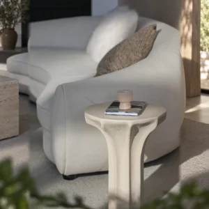 Sculptural Cream Side Table with Arched Forked Base in oatmeal — front view