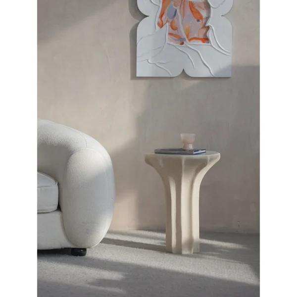 Sculptural Cream Side Table with Arched Forked Base in oatmeal — in a room setting