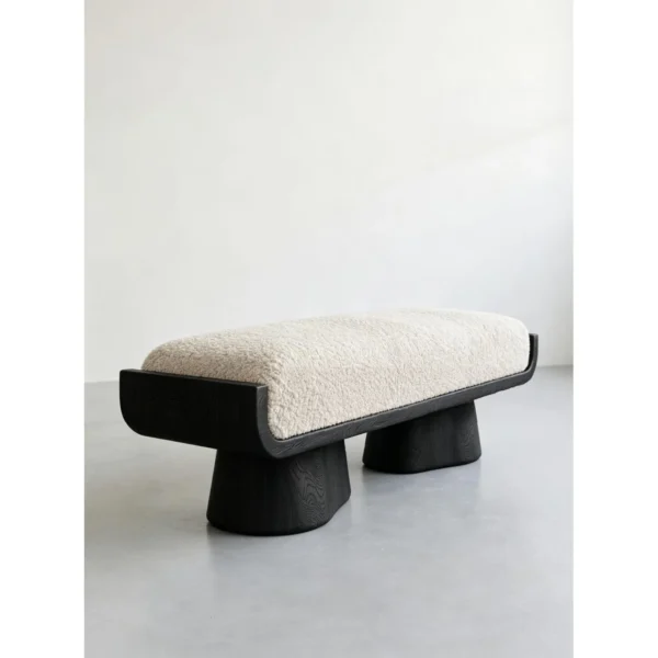 Sculptural Black Oak Bench with Cream Velvet Cushion, 128 cm in black — in a room setting