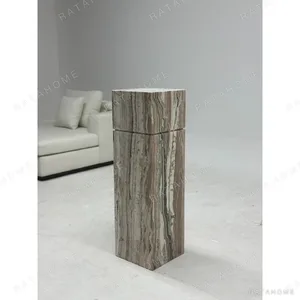 Zebra Onyx Sculptural Pedestal Table in clay — in a room setting