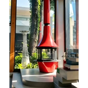 Sculptural Suspended Fireplace in red — in a room setting