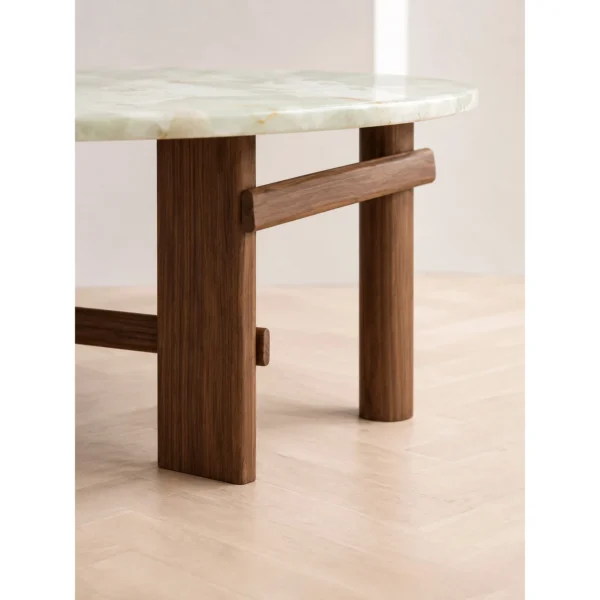 Sengu Jade Stone Round Table on Wood and Stone Base in olive — in a room setting